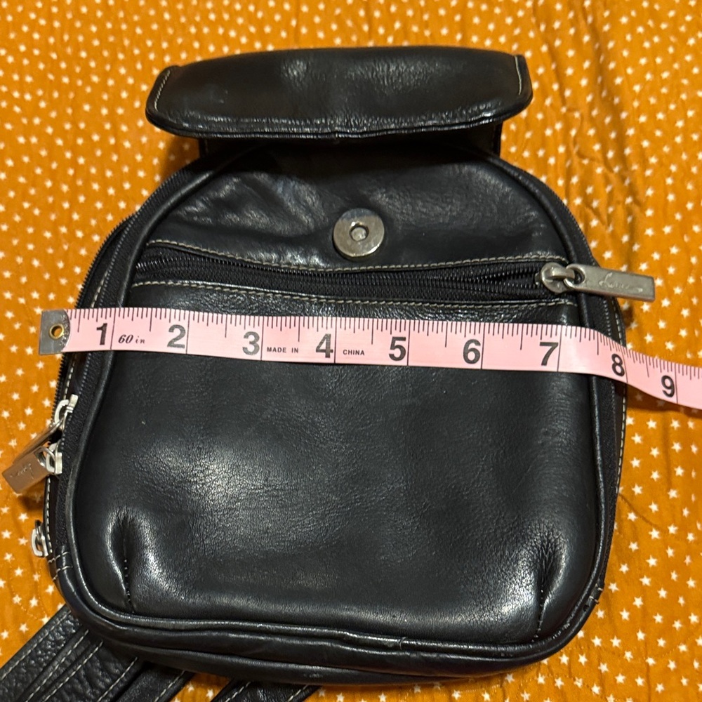 Classic Black Leather Women’s Sling Backpack - Picture 8 of 10